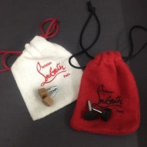 Authentic Christian Louboutin pouches with tips